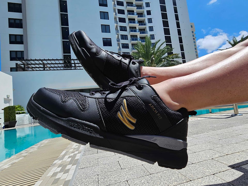 I model my Walk Hero Shoes by the pool