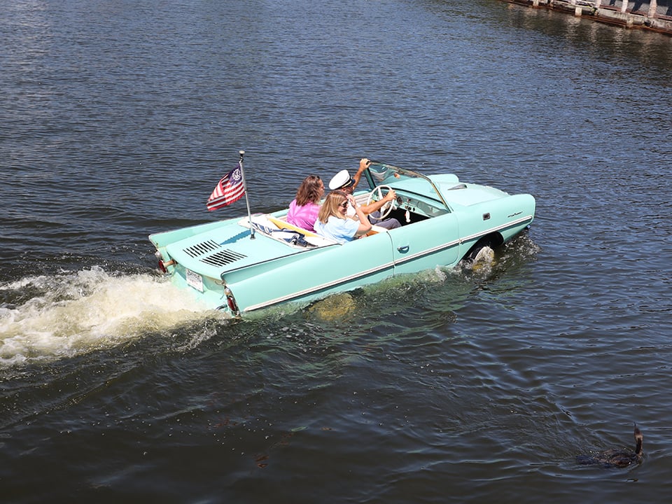 an amphicar in the water