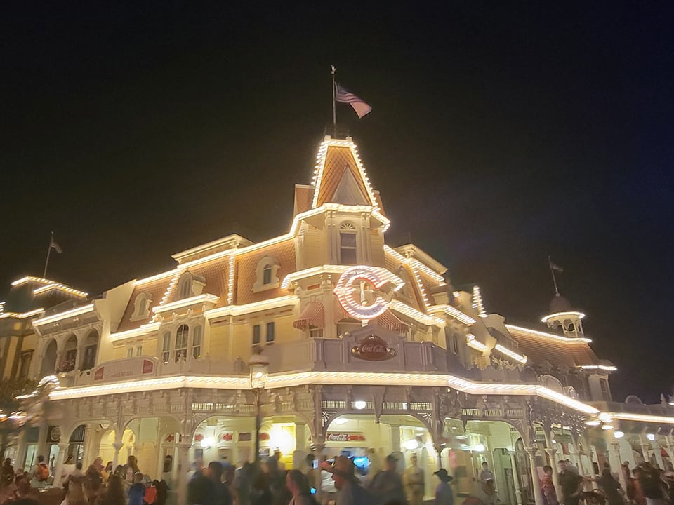 Main Street Magic Kingdom Flag at Night