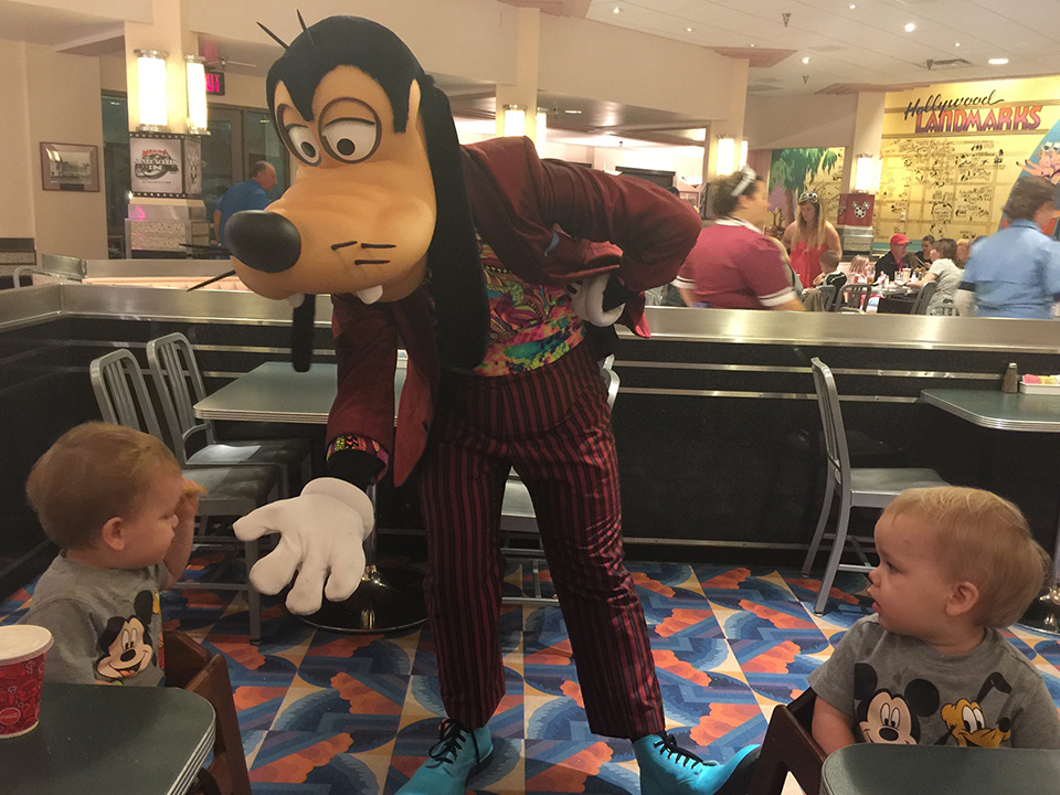 Goofy Character High Fives With Toddlers