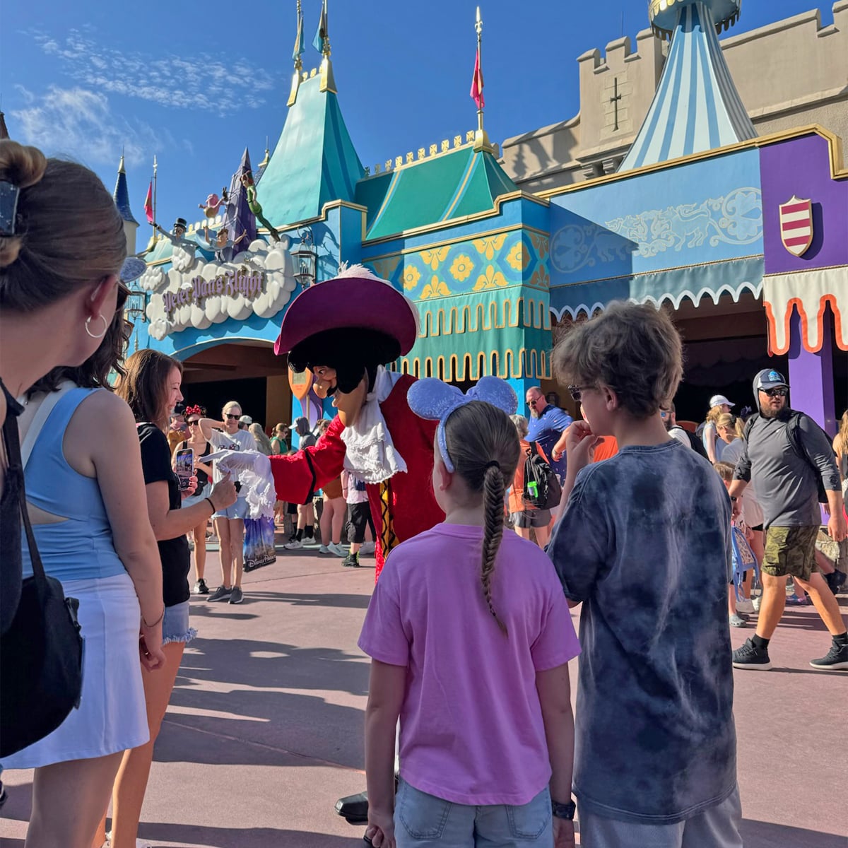 Captain Hook greets guests outside Peter Pan's Flight. (©John Gullion/Hey Orlando)