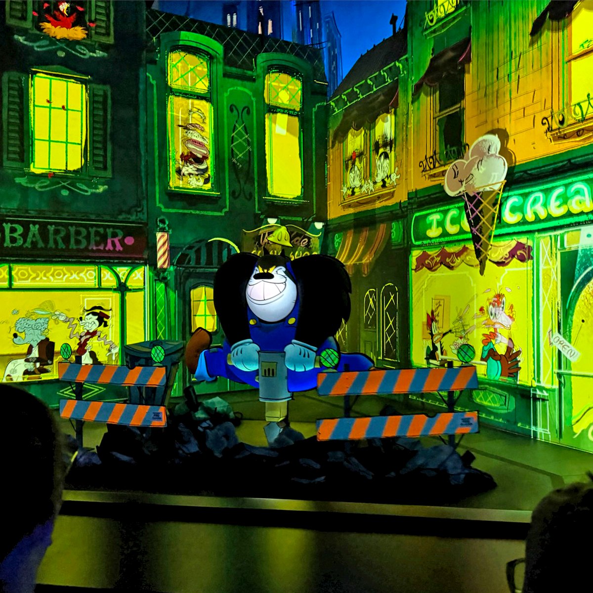 Pete does a little street work inside Mickey & Minnie's Runaway Railway. (John Gullion/Hey Orlando).