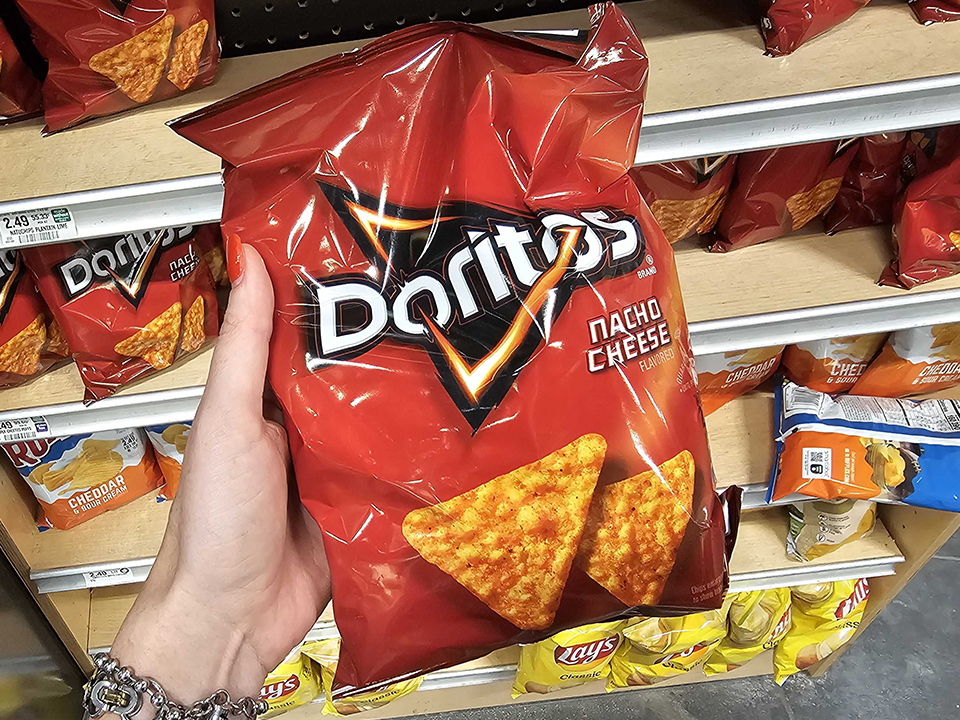 a bag of doritos at the grocery store
