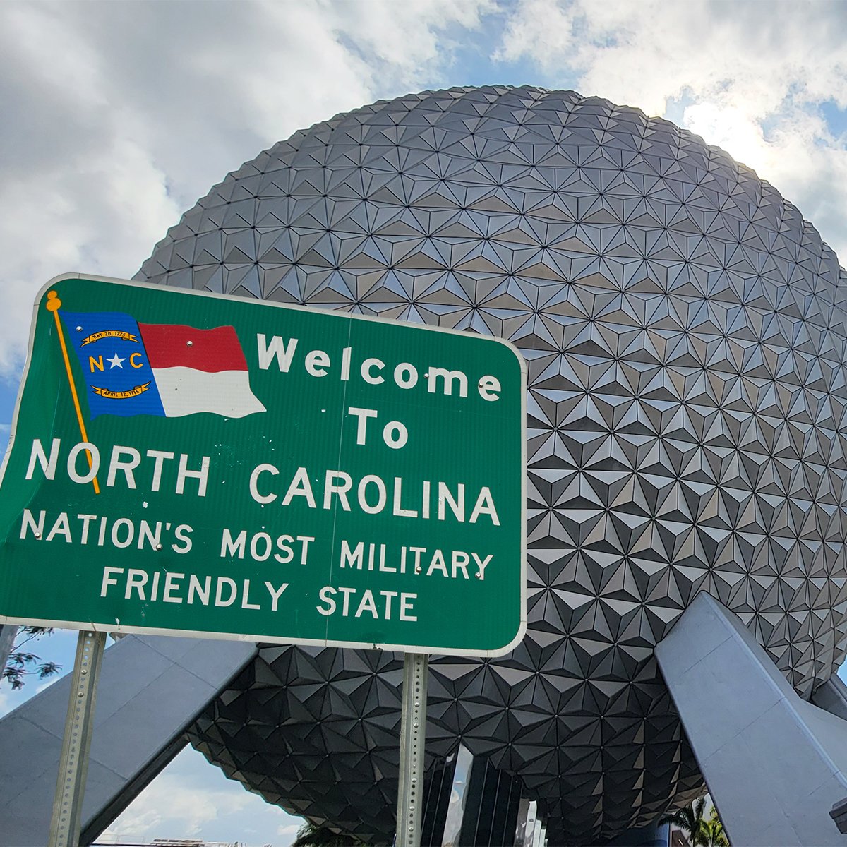 the epcot ball with welcome to north carolina sign