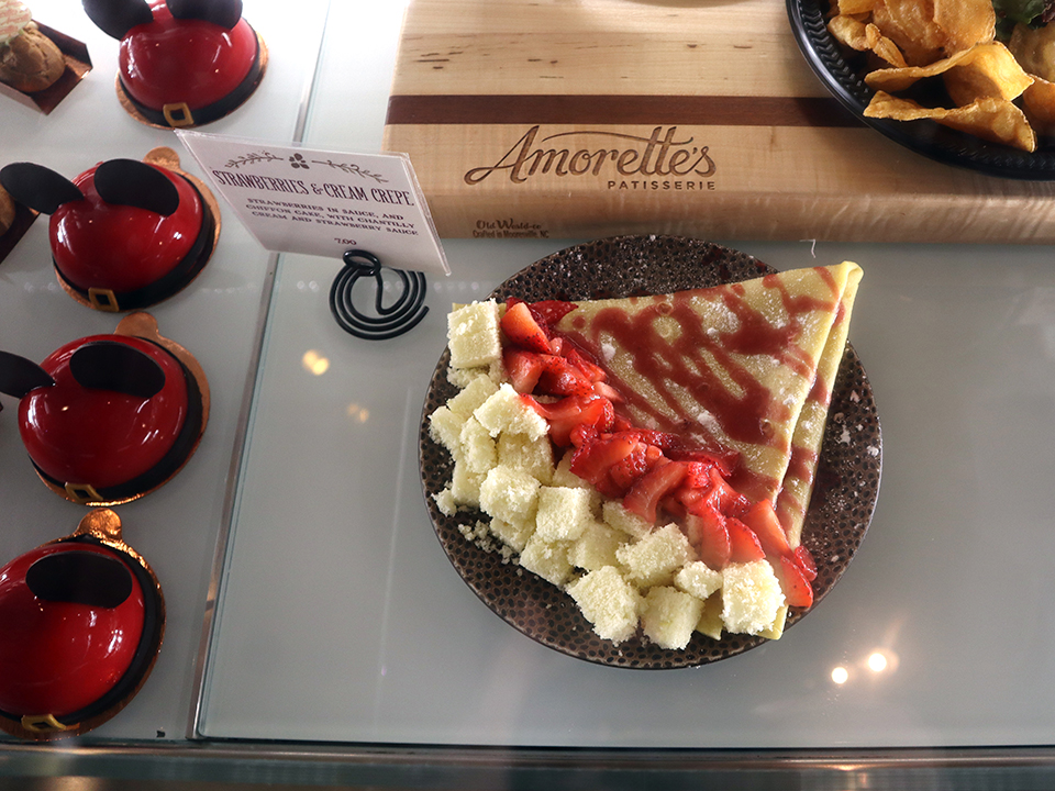 strawberries and crepe treat in window at disney springs