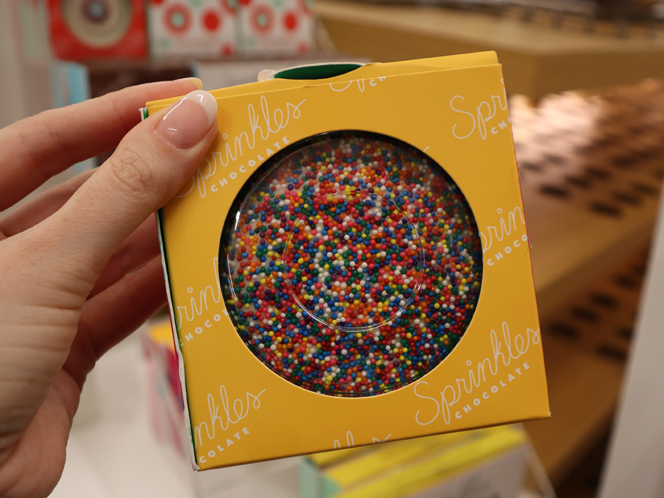 sprinkles cookie in yellow packaging